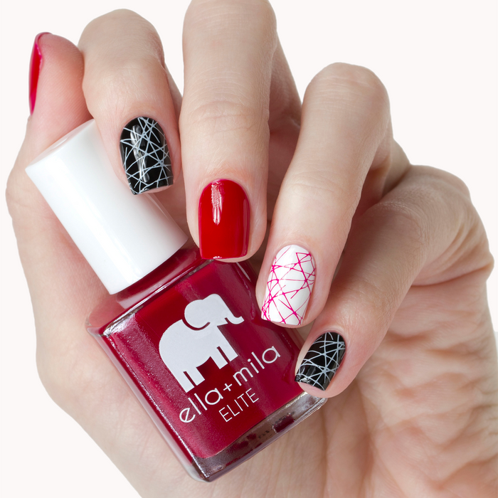 Naughty Not Nice red nail polish with black crackle accent nail art