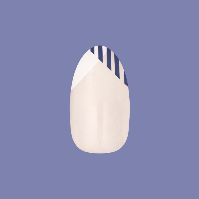Nautical Split French - Press-On | Medium | Oval nail with navy striped split french design on light beige base