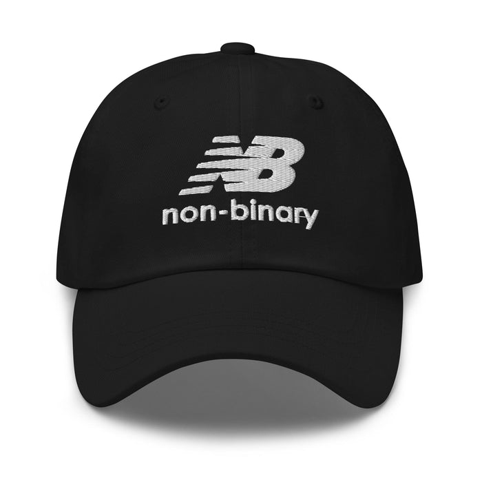 A black baseball cap featuring a white embroidered 'non-binary' logo on the front, set against a plain white background.