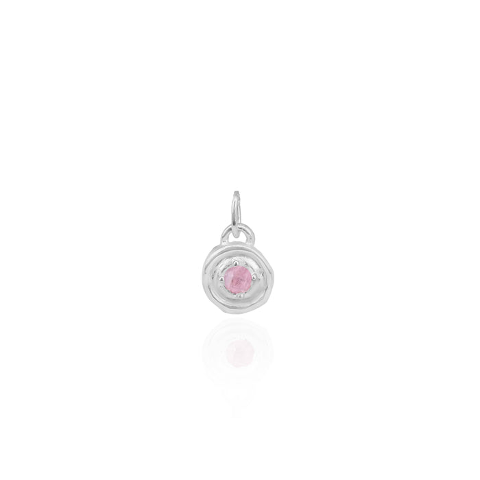 Silver pendant with a pink gemstone on a white background