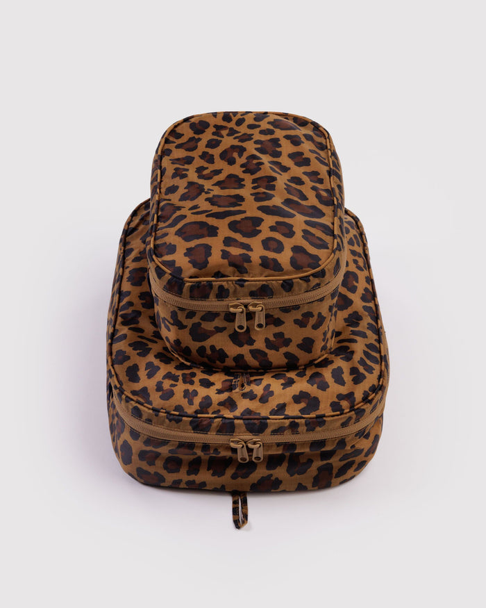Packing cube set in leopard print with multiple zip compartments