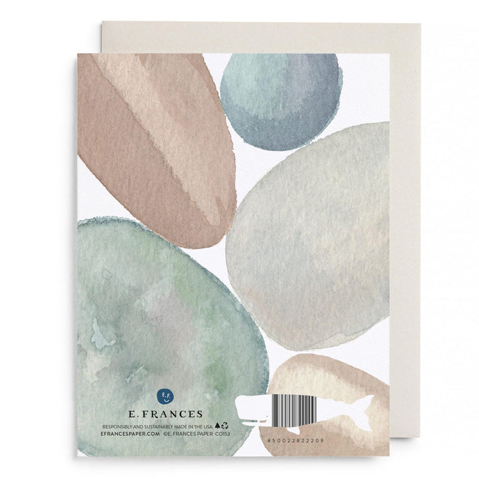 Greeting card back with watercolor rock shapes, E. Frances logo, barcode