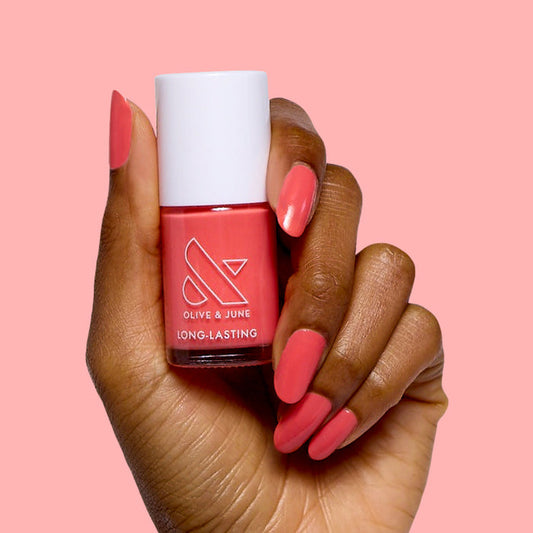 Perfect Pinwheel coral nail polish on natural nails with a smooth, long-lasting finish for an easy at-home mani