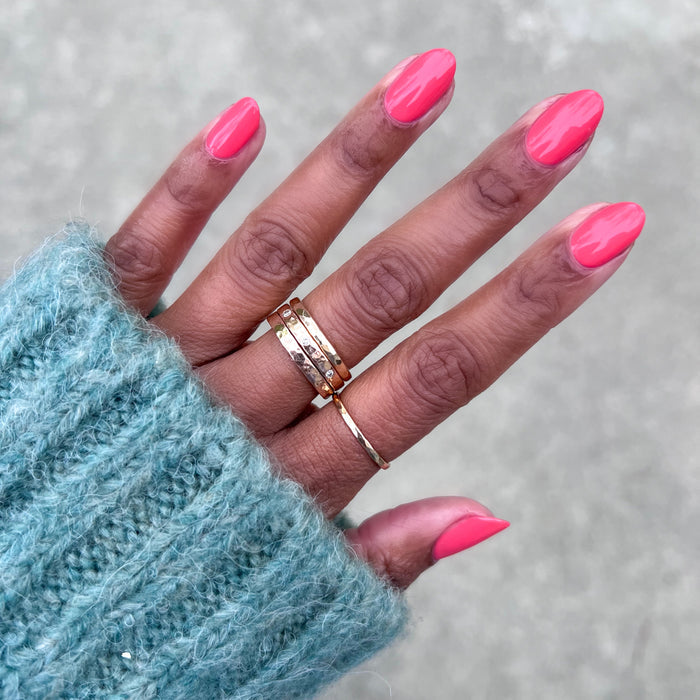 Perfect Pinwheel coral gel polish on natural nails with a smooth, glossy finish for a bright at-home manicure