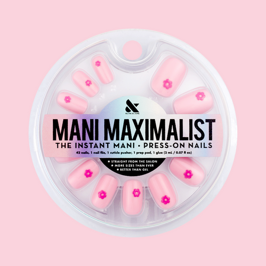 Puffy Daisy - Press-On | Short | Squoval showing press-on nails with tonal pink base and 3D hot pink flower design in round packaging