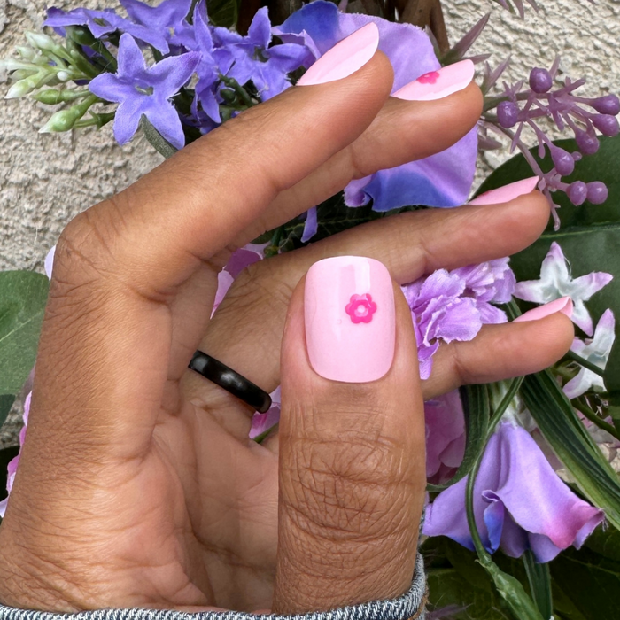 Puffy Daisy - Press-On | Short | Squoval showing hand with short squoval pink nails featuring 3D hot pink flower mani