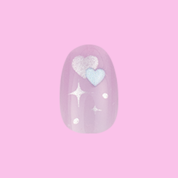 Puffy Hearts - Press-On | Short | Round showing short round press-on nail with sheer lavender base and puffy heart design