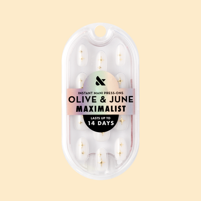 Puffy Sparkle - Press-On | Medium | Oval showing medium oval false nails with white base and 3D gold sparkle design