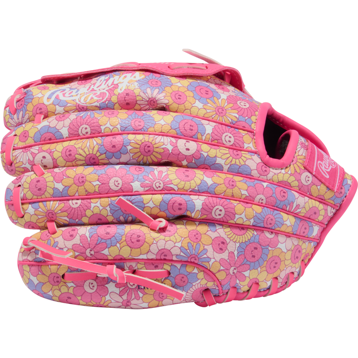 The Rawlings Players Series 10″ Youth Fastpitch Glove: PL10P is a pink Rawlings glove adorned with a vibrant floral pattern in shades of pink, yellow, and purple, measuring 10 inches and ideal for young infield players.