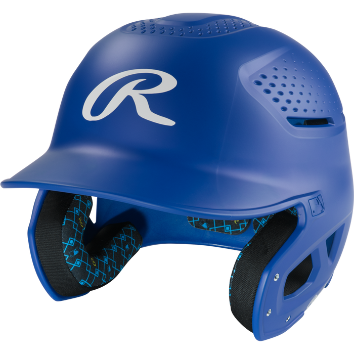 The Rawlings RX2 Matte Batting Helmet: RX2MAT in royal features ventilation holes, extended ear protection, and a padded geometric-pattern lining—ideal for youth comfort and safety.