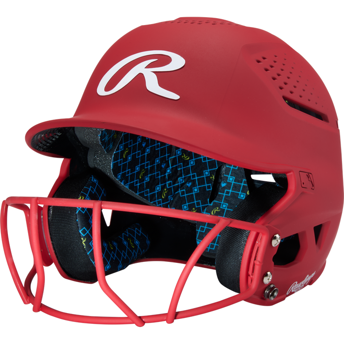 A Rawlings RX2 Matte Batting Helmet with Fastpitch Mask (RX2SBMAT) in scarlet, featuring a padded interior, is shown at an angle against a plain white background.