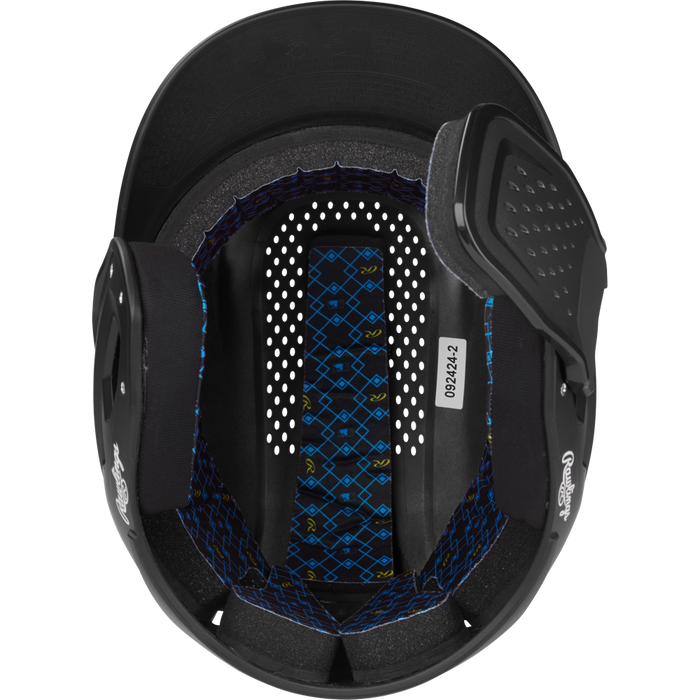 Top-down view of the Rawlings RX2 Reverse Matte Batting Helmet (RX2REVMAT) featuring padded ear protectors, a reversible flap system, blue and yellow lining, and a white sticker with numbers for NOCSAE-certified protection.