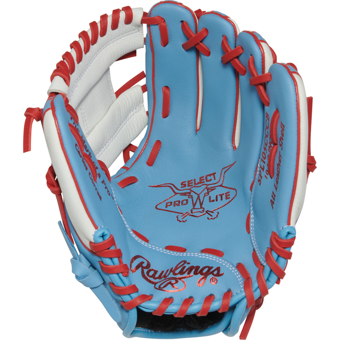 A Rawlings Select Pro Lite 10.5″ Carlos Correa Baseball Glove (SPL105CCCB) in blue and white with red laces is shown open, displaying the SELECT PRO LITE branding inside the pocket—an ideal youth glove for aspiring players.