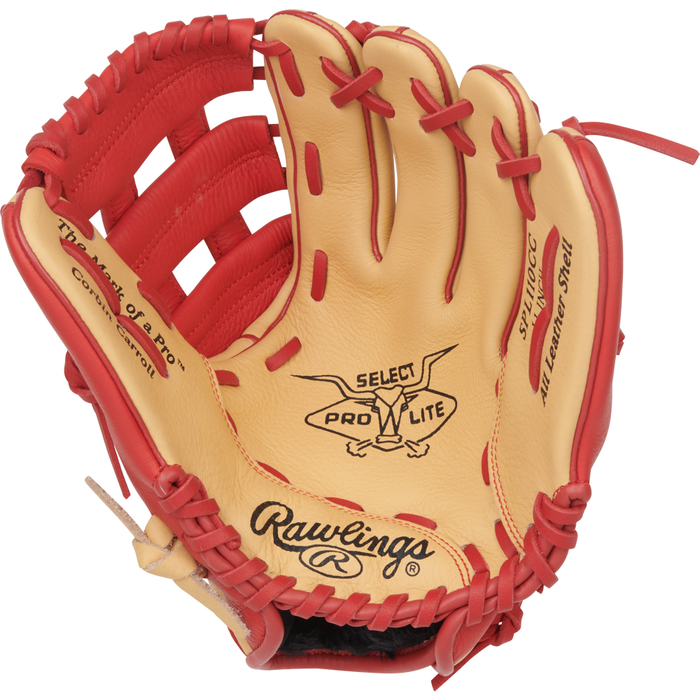 A tan and red Rawlings Select Pro Lite 11″ Corbin Carroll Baseball Glove (model SPL110CC) is open and facing upward, displaying the “Select Pro Lite” and “All Leather Shell” markings printed inside the palm area, along with the interior details and stitching.