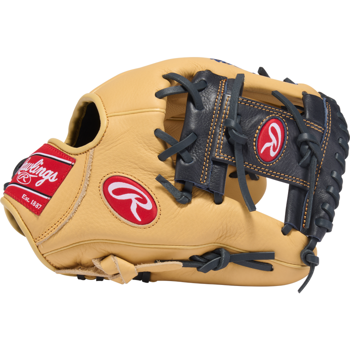 A tan Rawlings Select Pro Lite 11.25" Anthony Volpe youth baseball glove (SPL112AV) with black laces and red Rawlings logos, shown from the side on a plain white background.