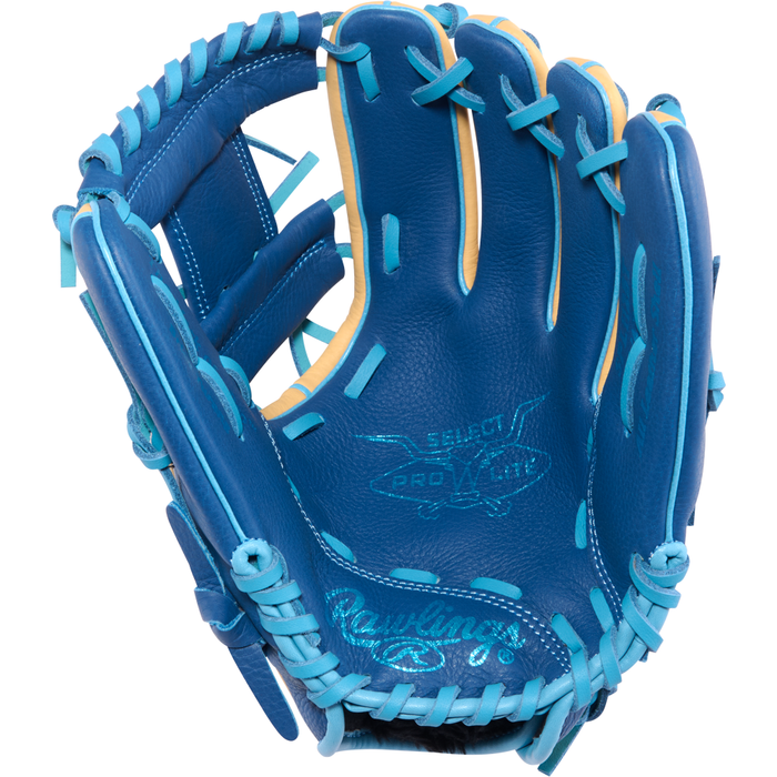 A Rawlings Select Pro Lite 11.25″ Brice Turang youth baseball glove in blue, featuring light blue laces and tan accents, is displayed open and facing forward. The glove showcases Select Pro Lite and Rawlings logos on the palm.