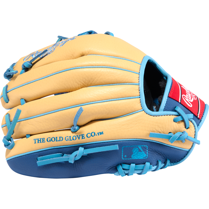 The Rawlings Select Pro Lite 11.25″ Brice Turang Baseball Glove (model SPL112BT) features a stylish tan and blue design with blue laces, the words “THE GOLD GLOVE CO.” printed on the side, and a signature red Rawlings patch by the wrist—making this youth infield glove ideal for aspiring players who want pro-level performance.