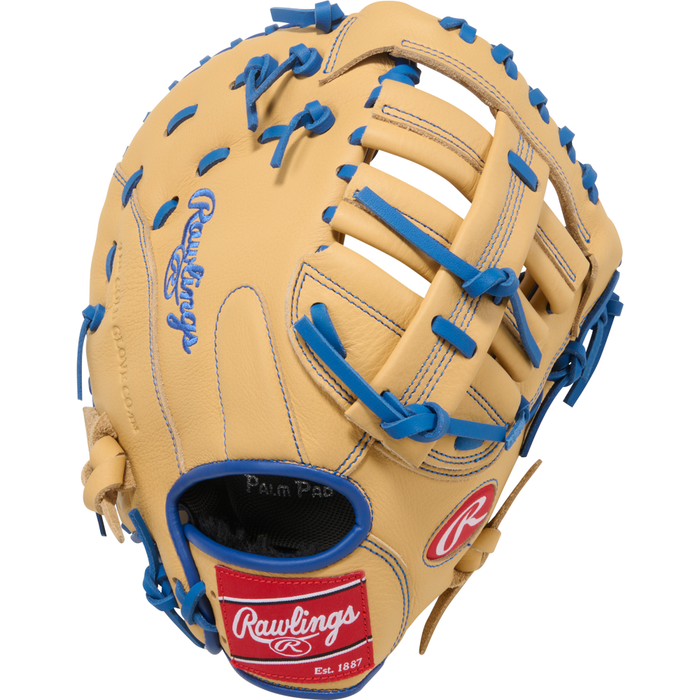 A tan Rawlings Select Pro Lite 11.5″ Freddie Freeman Baseball First Base Mitt (SPL115FFC) for youth, featuring blue laces and a red Rawlings logo patch on the wrist strap, inspired by Freddie Freeman’s popular mitt.