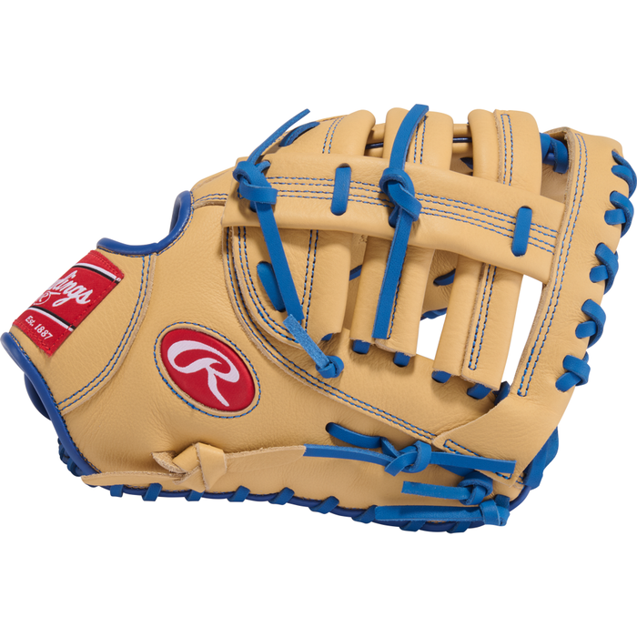 Inspired by the Rawlings Freddie Freeman mitt from the Select Pro Lite series, the Rawlings Select Pro Lite 11.5″ Freddie Freeman Baseball First Base Mitt (SPL115FFC) features a tan leather design with blue laces and accents, an open web pattern, detailed stitching throughout, and a red Rawlings logo patch on the side.