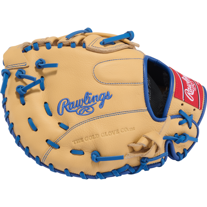 A tan and blue Rawlings Select Pro Lite 11.5″ Freddie Freeman Baseball First Base Mitt (model SPL115FFC) featuring blue stitching, a red Rawlings logo patch, and “The Gold Glove Co.” embossed on the leather—perfect for young players looking for a high-quality youth first base glove inspired by Freddie Freeman.
