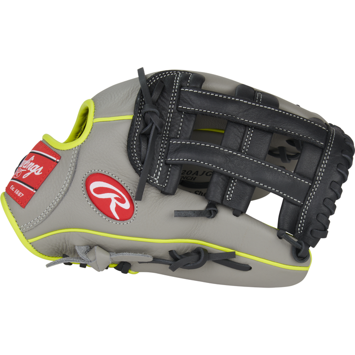 A side view of the Rawlings Select Pro Lite 12″ Aaron Judge Baseball Glove (SPL120AJG) by Rawlings is shown on a white background, featuring a grey and black design with yellow accents, red Rawlings logos, and black lacing. This youth baseball glove is inspired by Aaron Judge’s signature glove series.