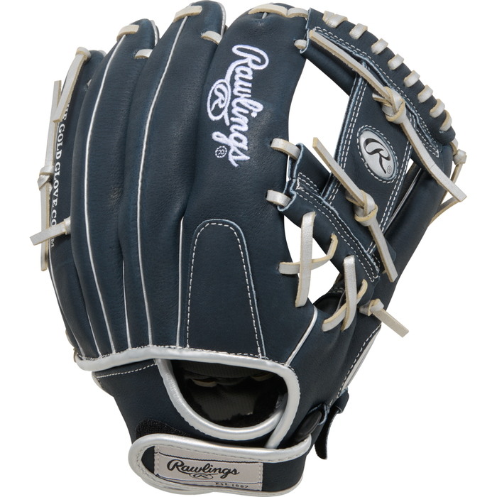 A Rawlings Sure Catch 11.5″ Anthony Volpe Youth Baseball Glove (SC115AV) in dark blue with white stitching and laces, featuring prominent Rawlings branding on the back and wrist strap, designed for young infielders.