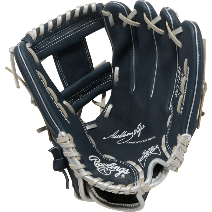 A Rawlings Sure Catch 11.5″ Anthony Volpe Youth Baseball Glove (model SC115AV) in dark blue with white stitching and tan laces, featuring the palm area and prominent brand logos, styled after Anthony Volpe’s infield glove.