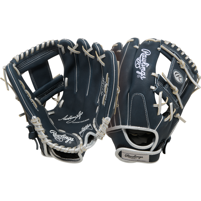 Two navy Rawlings Sure Catch 11.5″ Anthony Volpe Youth Baseball Gloves (SC115AV) with white stitching and laces are shown, displaying both the palm and backhand sides. Each glove features prominent Rawlings branding on the leather, making it an ideal youth baseball glove inspired by Anthony Volpe’s infield glove design.