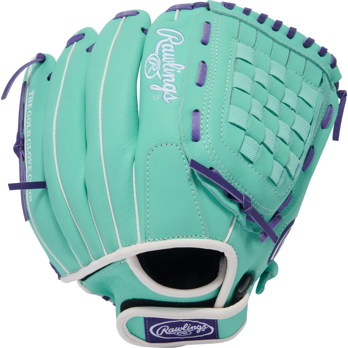 The Rawlings Sure Catch 11.5" Fastpitch Glove (SCSB115MW) is a teal youth glove with purple laces, white trim, branding on the wrist strap, woven web design, and "THE GOLD GLOVE CO." text on the thumb.