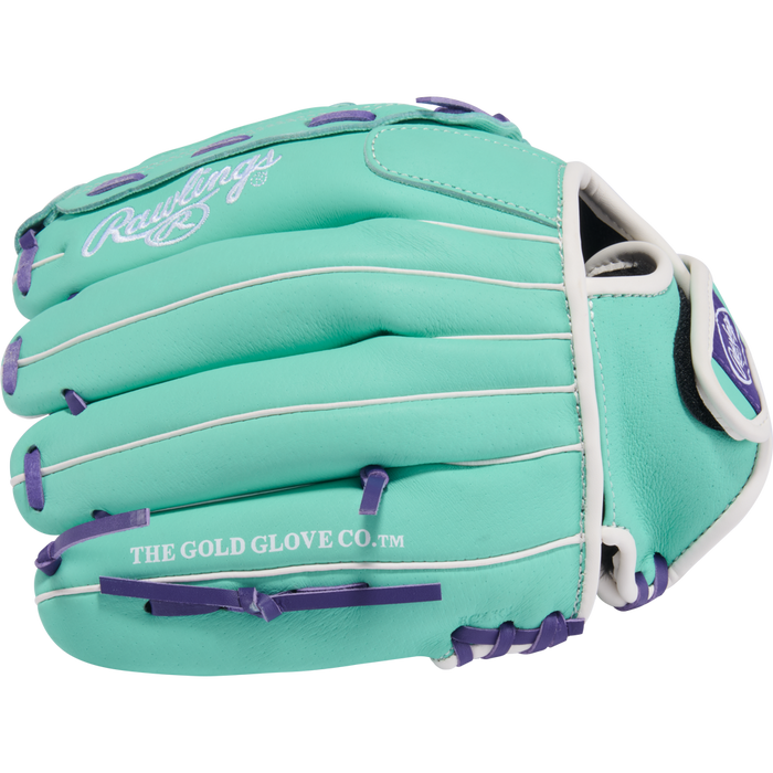 The Rawlings Sure Catch 11.5" Fastpitch Glove (SCSB115MW) is a teal youth glove with white lacing, purple accents, THE GOLD GLOVE CO.™ on the thumb, and the Rawlings logo—designed for easy fielding with Sure Catch technology.