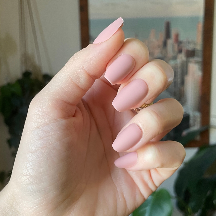 Rosewood Matte - Press-On | Medium | Coffin showing hand with soft rosey-brown matte medium coffin press-on nails