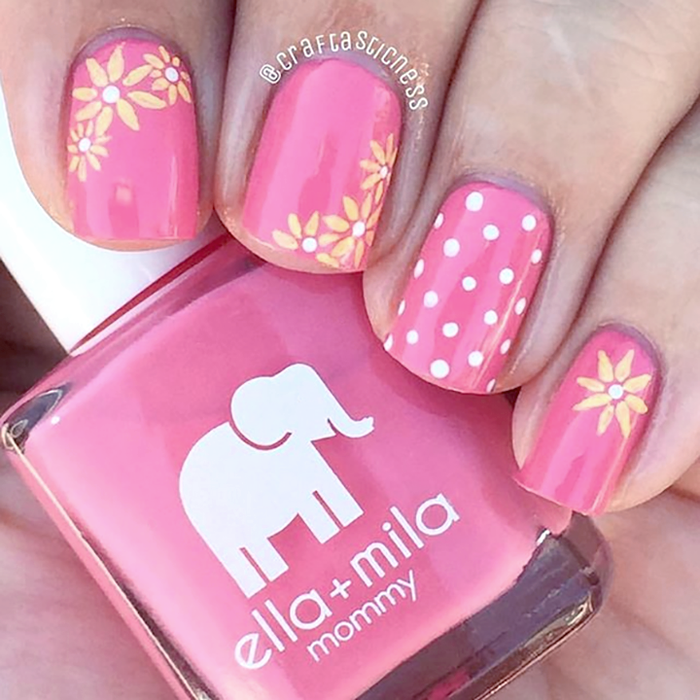 Rosy Cheeks pink nail polish with white floral and polka dot nail art