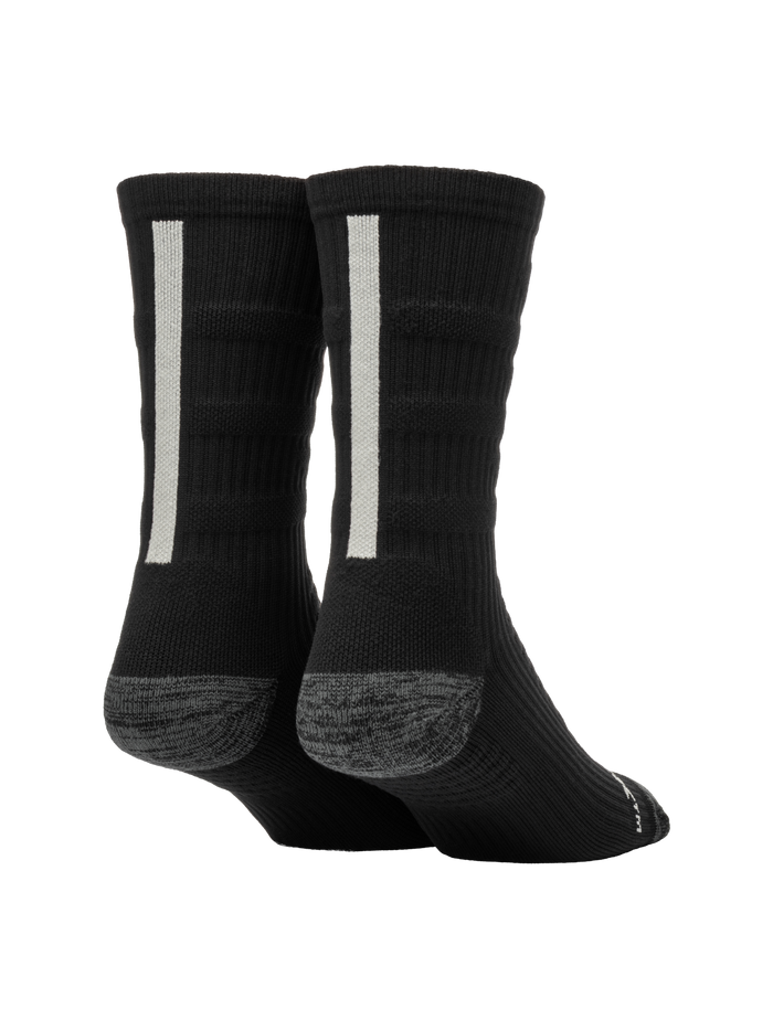 Rear three-quarter view of Selkirk Courtlock crew pickleball socks showcasing vertical gray back stripe and gray reinforced heel on white background