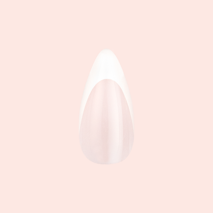 Sharp French - Press-On | Medium | Stiletto showing a single pointed stiletto false nail with classic french manicure design on pale pink background