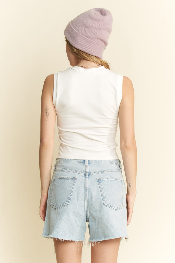 Jade by Jane solid sleeveless tank top in a neutral color, displayed flat with a smooth fabric texture.
