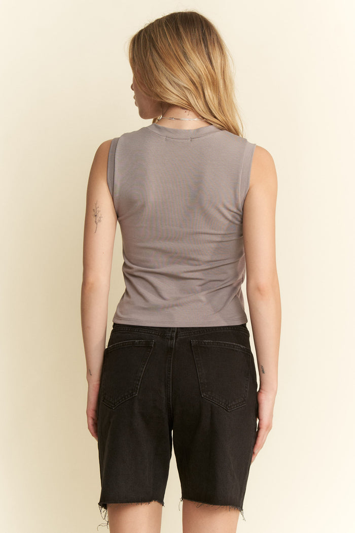 Jade by Jane solid sleeveless tank top with a scoop neckline, made from soft fabric, shown on a white background.