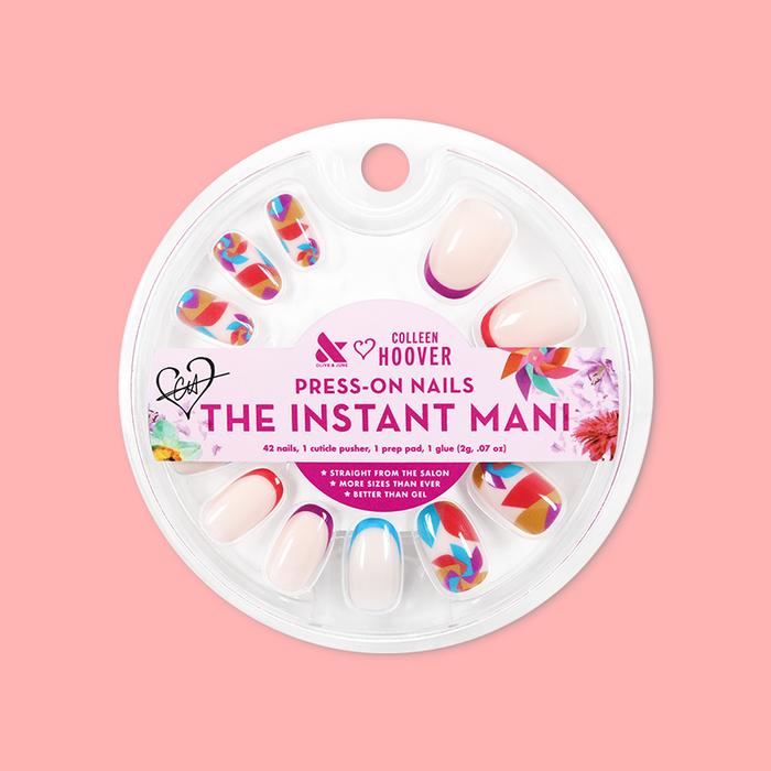 Spinning Pinwheel - Press-On | Short | Round showing short round nails with neutral French and colorful pinwheel design in packaging