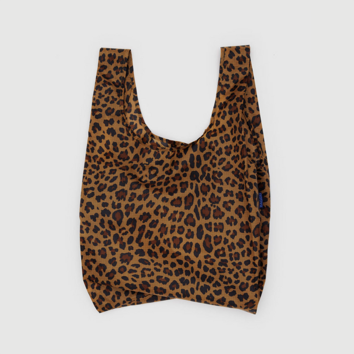 Reusable tote bag in brown with leopard-print pattern and short U-shaped handles.