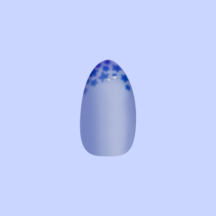 Starry Matte Magic Mani - Press-On | Medium | Almond with matte blue base and glossy star accents on almond-shaped press-on nail