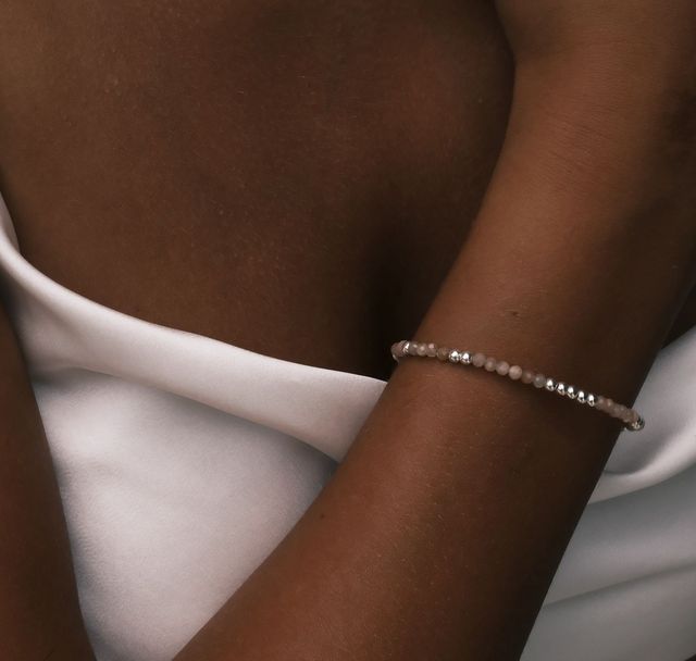 a woman wearing The Billy Blush Bracelet Silver by Luna and Rose Bali