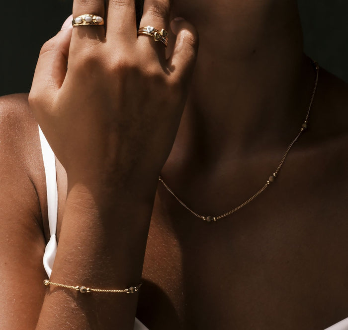 a woman wearing The Sunstone Bracelet Gold by Luna and Rose Bali