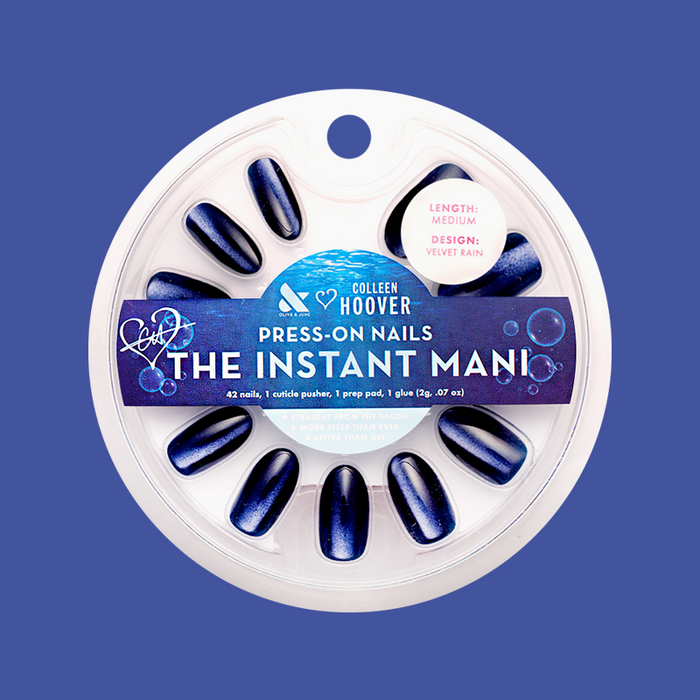 Velvet Rain - Press-On | Medium | Oval showing dark shiny velvet effect rain cloud blue medium oval press-on false nails in package