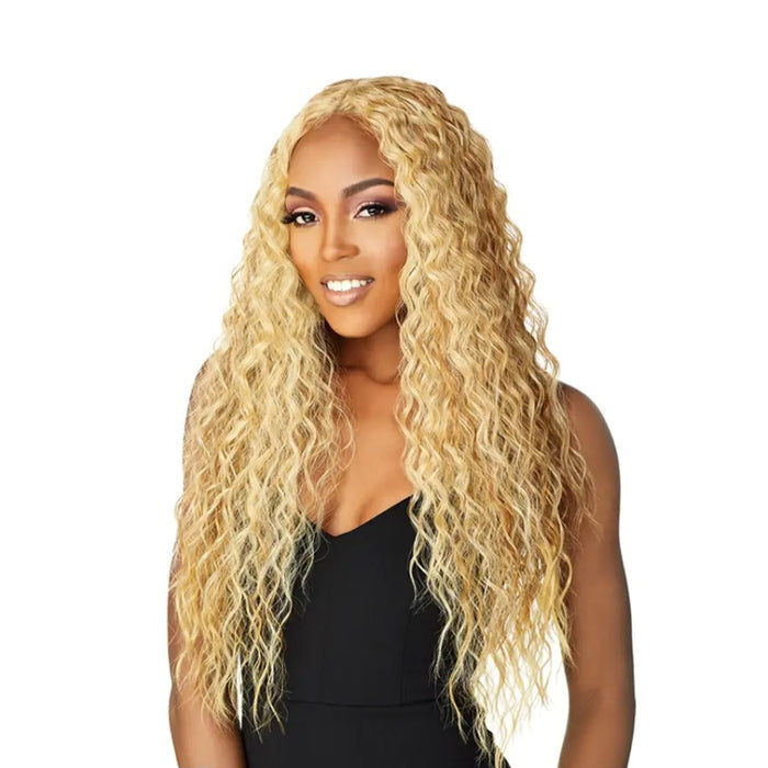 Long blonde wavy Swiss lace front wig on smiling model with center part wearing black outfit
