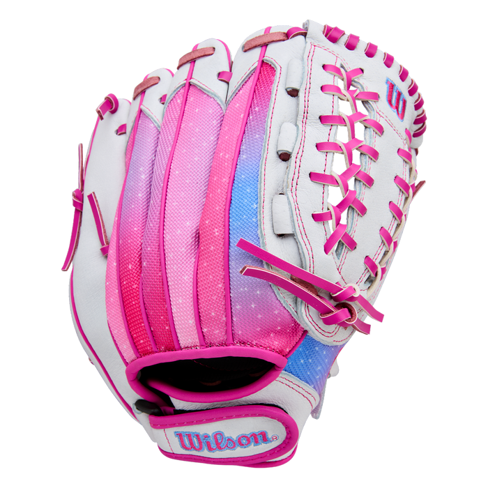The Wilson Flash 12" Fastpitch Glove (WBW10398712) by Wilson is a white youth glove with pink laces, pink and blue gradient accents on the back, shown against a plain white background.