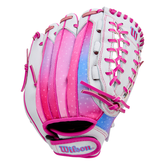 The Wilson Flash 12" Fastpitch Glove (WBW10398712) by Wilson is a white youth glove with pink laces, pink and blue gradient accents on the back, shown against a plain white background.